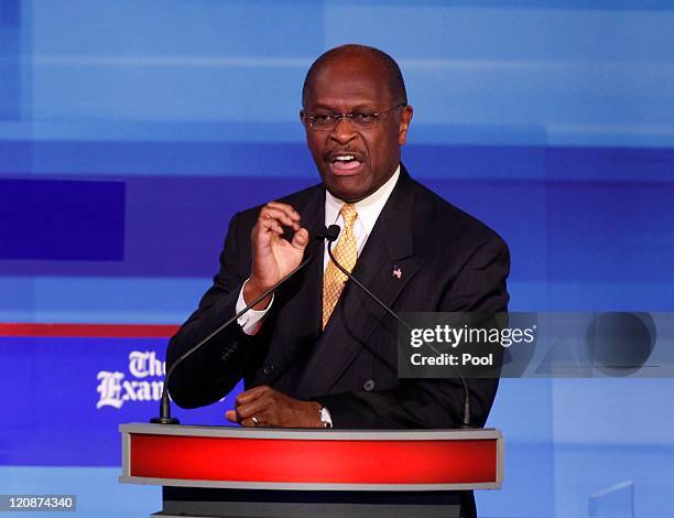 Republican presidential candidate businessman Herman Cain speaks during the Iowa GOP/Fox News Debate on August 11, 2011 at the CY Stephens Auditorium...