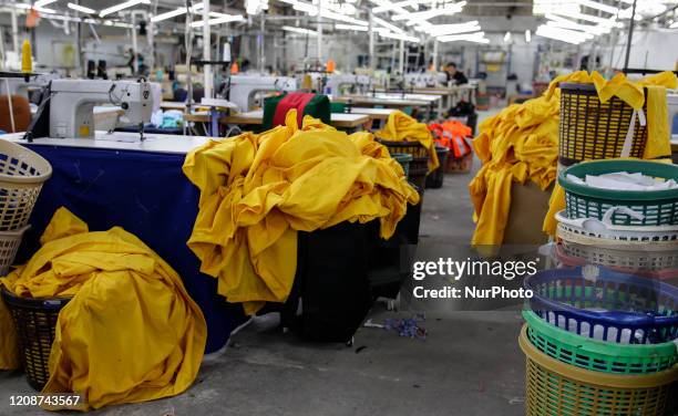 Manufacture protective coverall suits and masks at a workshop in Gaza City on March 31, 2020. Amid coronavirus COVID-19 pandemic. Factories in the...