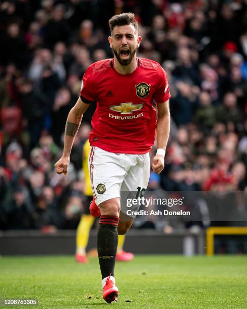 Bruno Fernandes of Manchester United celebrates scoring their first goal during the Premier League match between Manchester United and Watford FC at...