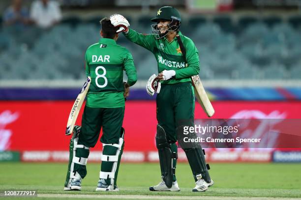 Nida Dar of Pakistan and Bismah Maroof of Pakistan celebrate winning the ICC Women's T20 Cricket World Cup match between the West Indies and Pakistan...