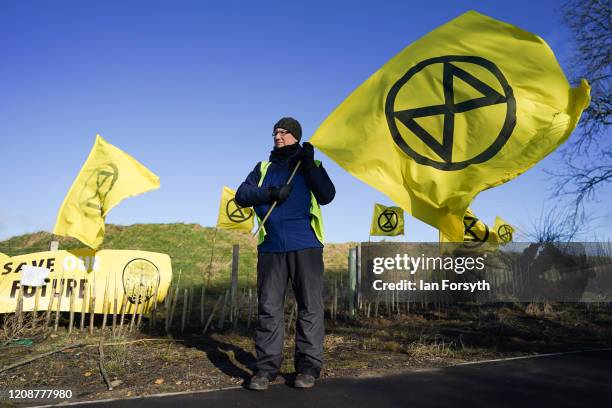 Extinction Rebellion demonstrators join with local campaigners to begin a three-day mass action protest at the Bradley Open Cast coal mine on...