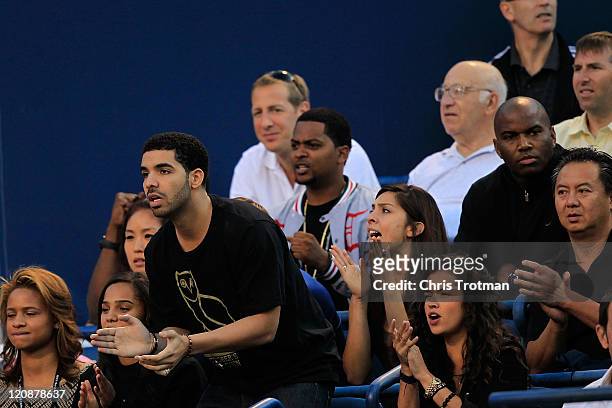 Drake attend the tennis match between Serena Williams versus Jie Zheng of China on Day 4 of the Rogers Cup presented by National Bank at the Rexall...