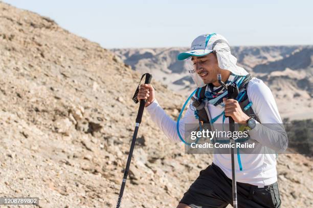 Karim Zeroual walks on Day 2 of the Sport Relief challenge: The Heat is On, as the team sets off on February 25, 2020 in the Namib Desert, Namibia....