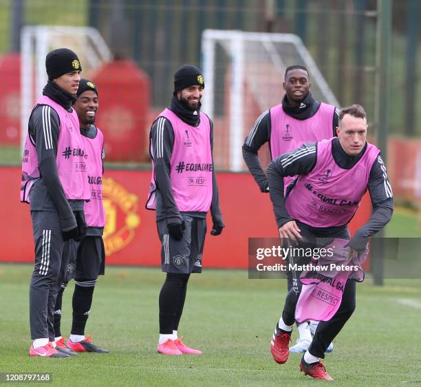 Mason Greenwood, Angel Gomes, Bruno Fernandes, Aaron Wan-Bissaka and Phil Jones of Manchester United in action during a first team training session...