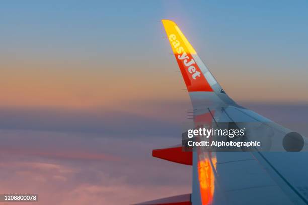 an easyjet aircraft wing - easyjet stock pictures, royalty-free photos & images