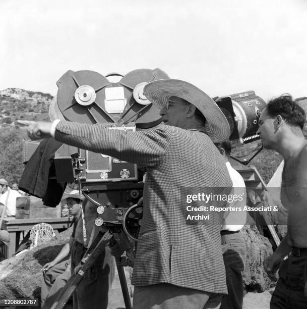 Italian director Mario Camerini directing at the camera the film Ulysses. 1953