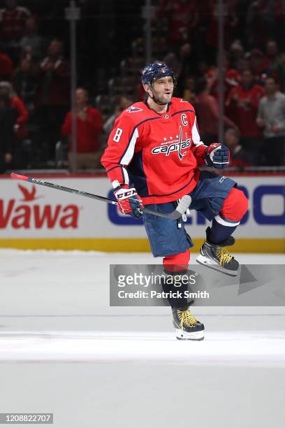 Alex Ovechkin of the Washington Capitals celebrates after scoring during a shootout against the Winnipeg Jets at Capital One Arena on February 25,...