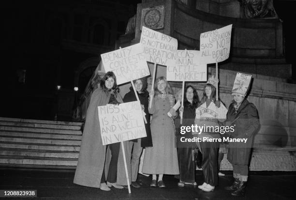 Activists and members of the 'Women's Liberation Movement' protest against the Miss World Beauty Pageant outside the Royal Albert Hall where the...