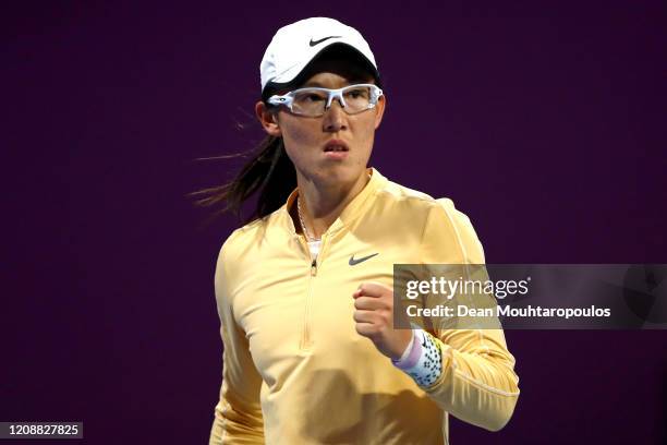 Saisai Zheng of China celebrates winning a point against Kiki Bertens of the Netherlands during Day 4 of the WTA Qatar Total Open 2020 at Khalifa...