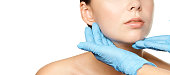 Facelift hydra treats. Esthetic skin care analysis. Doctor hands in gloves. medicine facial beauty exam. Symmetry consult. Cosmetology wrinkle specialist
