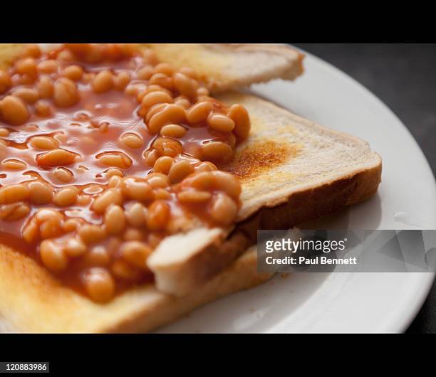 baked beans on toast - bean stock pictures, royalty-free photos & images