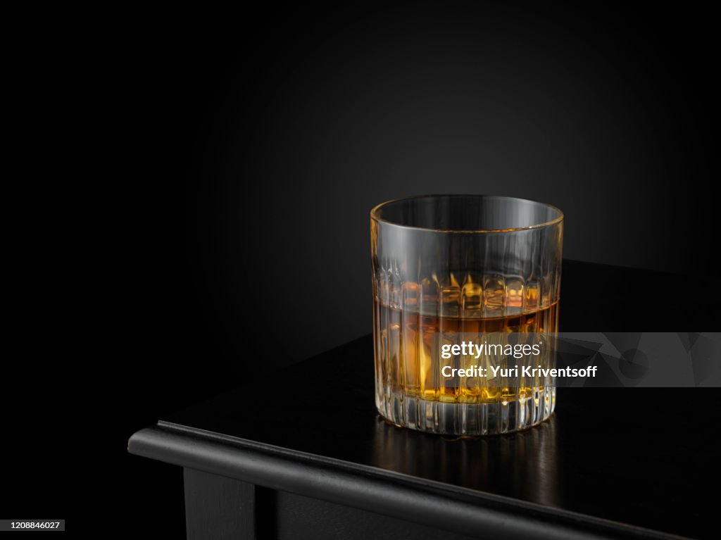 Glass of whiskey on ice
