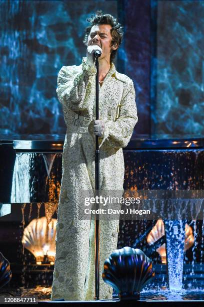 Harry Styles performs on stage during The BRIT Awards 2020 at The O2 Arena on February 18, 2020 in London, England.