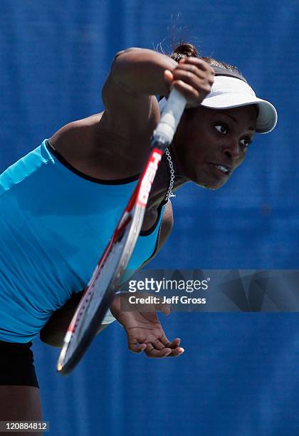 Sloane Stephens hits a serve to Shuai Zhang of China during the Mercury Insurance Open presented by Tri-City Medical at the La Costa Resort and Spa...
