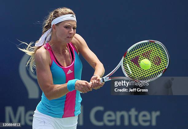 Maria Kirilenko of Russia returns a backhand to Rebecca Marino of Canada during the Mercury Insurance Open presented by Tri-City Medical at the La...