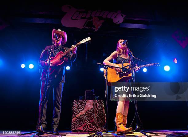 David Rawlings and Gillian Welch perform at Tipitina's on August 11, 2011 in New Orleans, Louisiana.