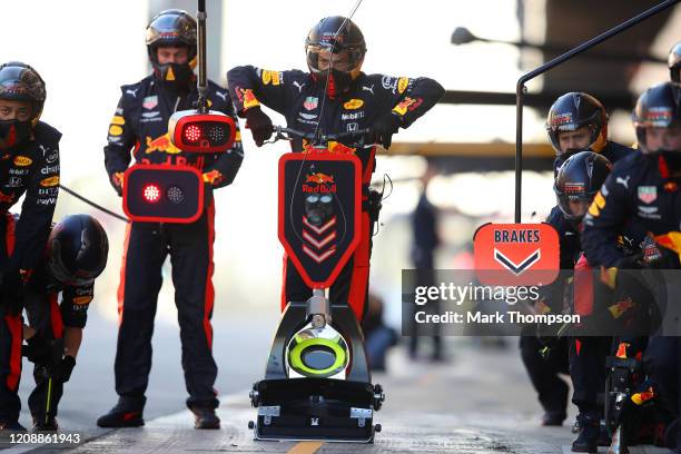 The Red Bull Racing team practice pit stops during Day One of F1 Winter Testing at Circuit de Barcelona-Catalunya on February 26, 2020 in Barcelona,...