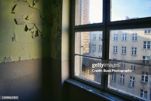 window in abandoned domestic interior - psychiatric hospital stock pictures, royalty-free photos & images