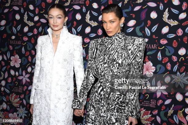 Gigi Hadid and Bella Hadid attend the Harper's Bazaar Exhibition as part of the Paris Fashion Week Womenswear Fall/Winter 2020/2021 At Musee Des Arts...