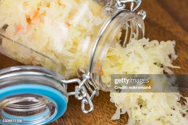 homemade sauerkraut in a jar - choucroute stock-fotos und bilder