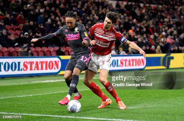 Helder Costa of Leeds United battles for possession with George Friend of Middlesborough during the Sky Bet Championship match between Middlesbrough...