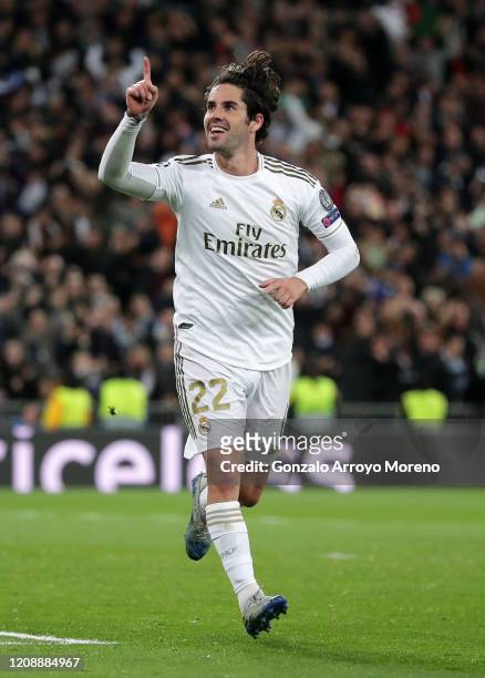 Isco of Real Madrid celebrates after scoring his team's first goal during the UEFA Champions League round of 16 first leg match between Real Madrid...
