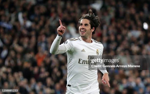 Isco of Real Madrid celebrates after scoring his team's first goal during the UEFA Champions League round of 16 first leg match between Real Madrid...