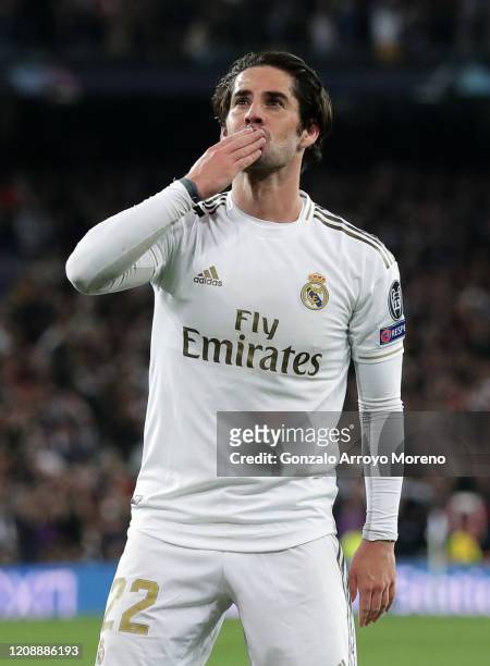 Isco of Real Madrid celebrates after scoring his team's first goal during the UEFA Champions League round of 16 first leg match between Real Madrid...