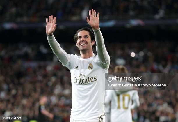 Isco of Real Madrid celebrates after scoring his team's first goal during the UEFA Champions League round of 16 first leg match between Real Madrid...