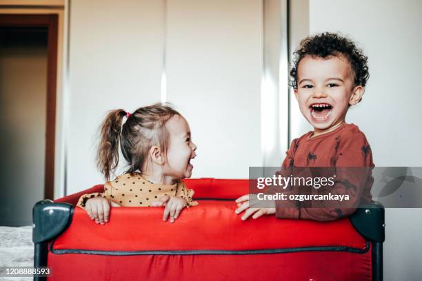 happy child - siblings baby stock pictures, royalty-free photos & images