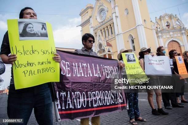 Journalists demonstrate against the murder of their colleague Maria Helena Ferral at Lerdo square in Xalapa, Veracruz state, Mexico on April 1, 2020....
