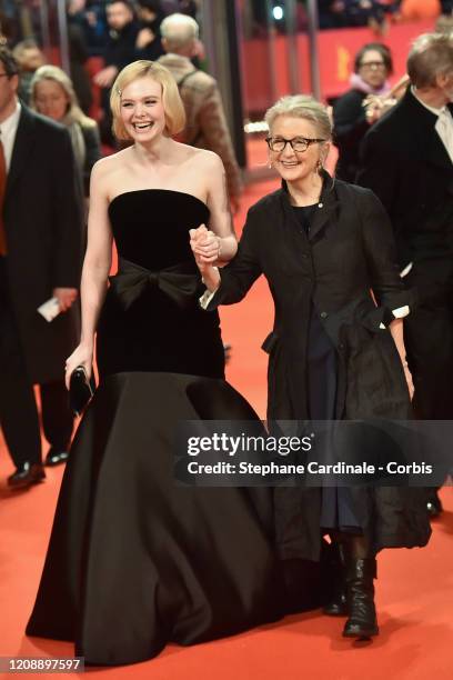 Elle Fanning and Sally Potter arrive at the "The Roads Not Taken" premiere during the 70th Berlinale International Film Festival Berlin at Berlinale...