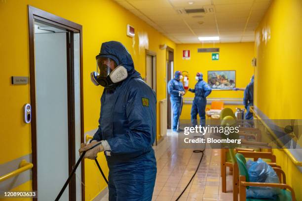 Soldiers from the Russian military disinfect a corridor during their full disinfection of the Foundation of Ponte S. Pietro nursing home in Ponte San...