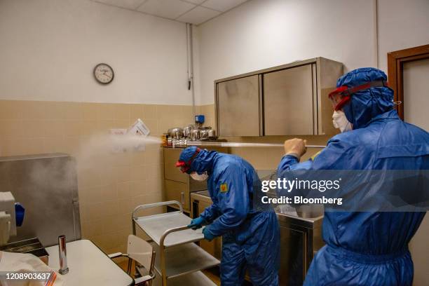 Soldiers from the Russian military disinfect a kitchen during their full disinfection of the Foundation of Ponte S. Pietro nursing home in Ponte San...