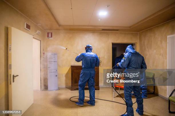 Soldiers from the Russian military spray disinfectant during their full disinfection of the Foundation of Ponte S. Pietro nursing home in Ponte San...