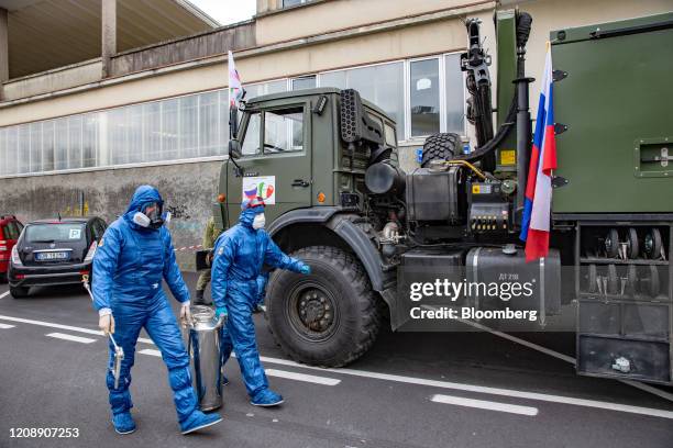 Soldiers from the Russian military pack equipment following their full disinfection of the Foundation of Ponte S. Pietro nursing home in Ponte San...