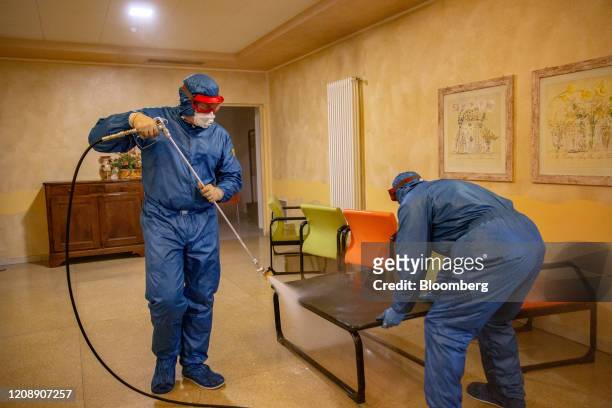 Soldiers from the Russian military spray disinfectant during their full disinfection of the Foundation of Ponte S. Pietro nursing home in Ponte San...