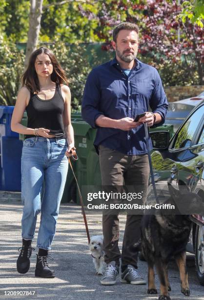 Ben Affleck and Ana de Armas walk their dogs on April 01, 2020 in Los Angeles, California.