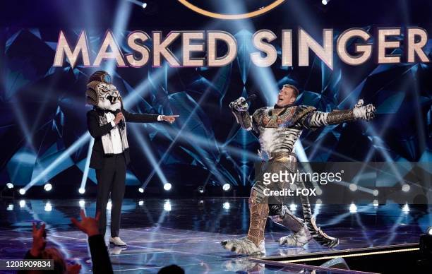 : Host Nick Cannon and Rob Gronkowski in The Super Nine Masked Singer Special: Groups A, B & C special two-hour episode of THE MASKED SINGER airing...