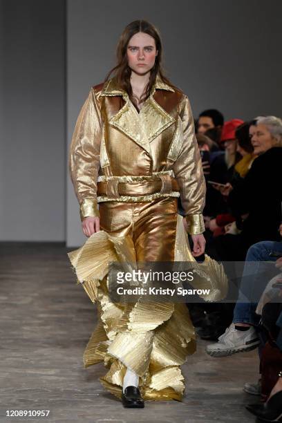 Model walks the runway during the Moon Young Hee show as part of Paris Fashion Week Womenswear Fall/Winter 2020/2021 on February 26, 2020 in Paris,...