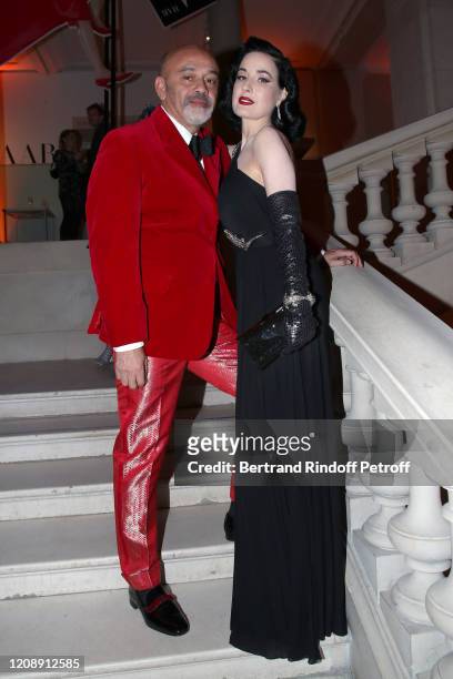 Christian Louboutin and Dita Von Teese attend the Harper's Bazaar Exhibition as part of the Paris Fashion Week Womenswear Fall/Winter 2020/2021 At...
