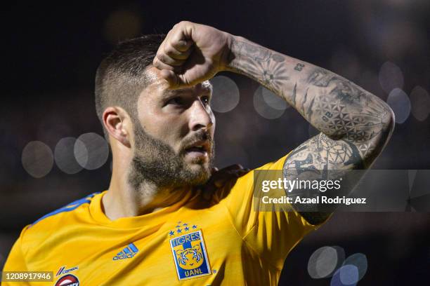Andre-Pierre Gignac of Tigres celebrates after scoring his team's third goal via penalty during the round of 16 match between Tigres UANL and Alianza...