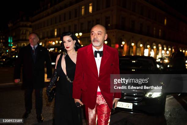 Dita Von Teese and Christian Louboutin attend the Harper's Bazaar Exhibition as part of the Paris Fashion Week Womenswear Fall/Winter 2020/2021 At...