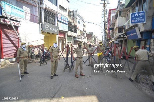 Police personnel at a road block during search operation for devotees who had recently attended the religious congregation at Tabligh-e-Jamaat's...