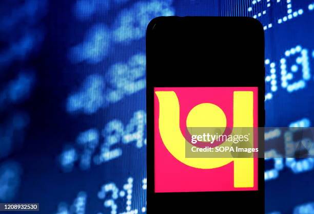 In this photo illustration a Logo of Punjab National Bank seen displayed on a smartphone.