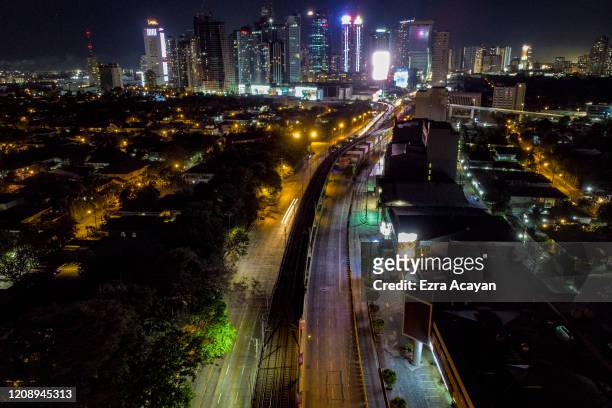 An aerial view of the nearly empty Epifanio Delos Santos Avenue , Metro Manila's main highway, on April 2, 2020 in Quezon city, Metro Manila,...