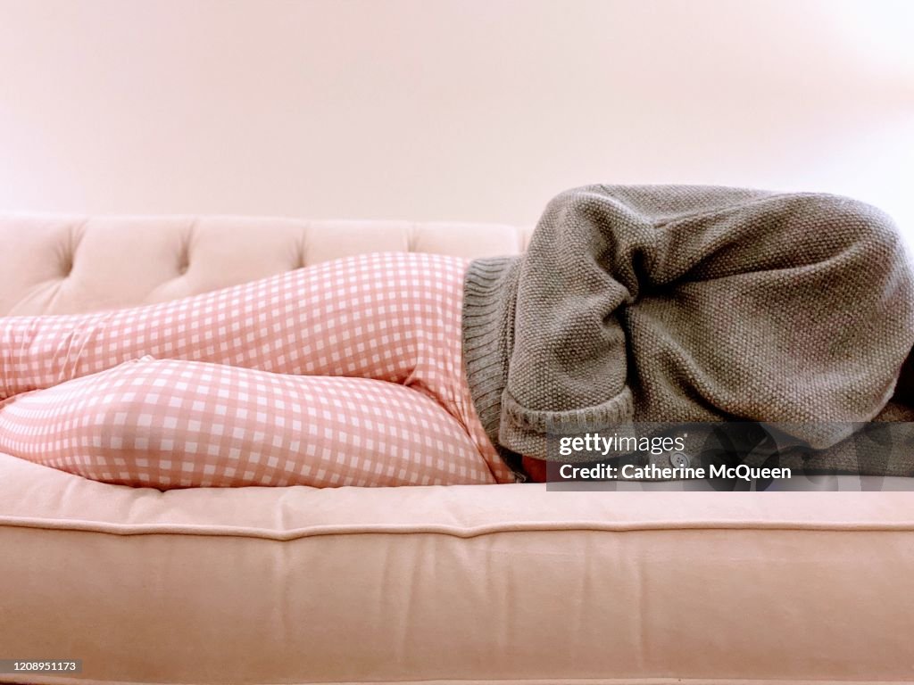 African-american woman experiences stomach pain