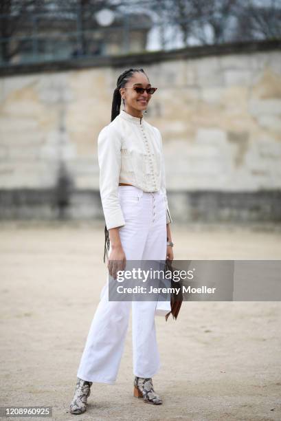 Fashion Week guest is seen outside Dior during Paris Fashion Week - Womenswear Fall/Winter 2020/2021 : Day Two on February 25, 2020 in Paris, France.