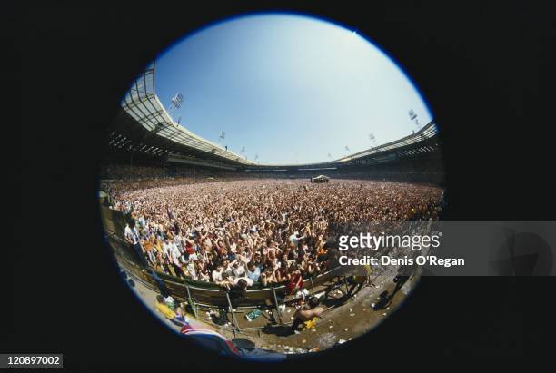 Fish-eye view of the crowd at the Live Aid charity concert, Wembley Stadium, London, 13th July 1985.
