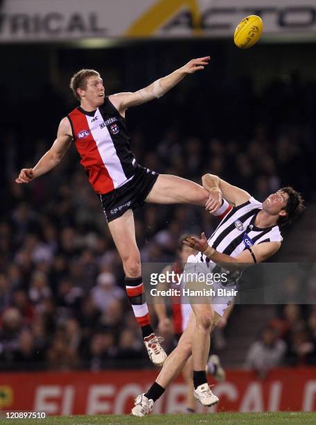 Ben McEvoy of the Saints wins a ruck contest against Leigh Brown of the Magpies during the round 21 AFL match between the St Kilda Saints and the...